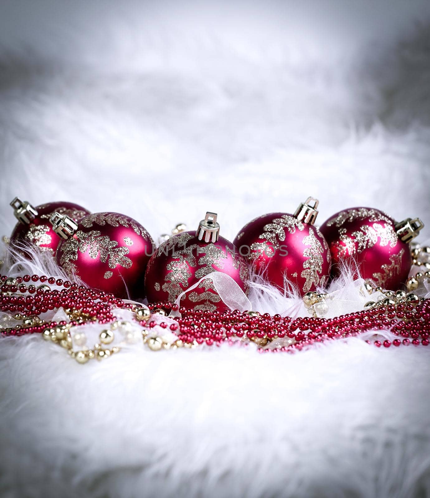 red Christmas balls on a festive white background by SmartPhotoLab