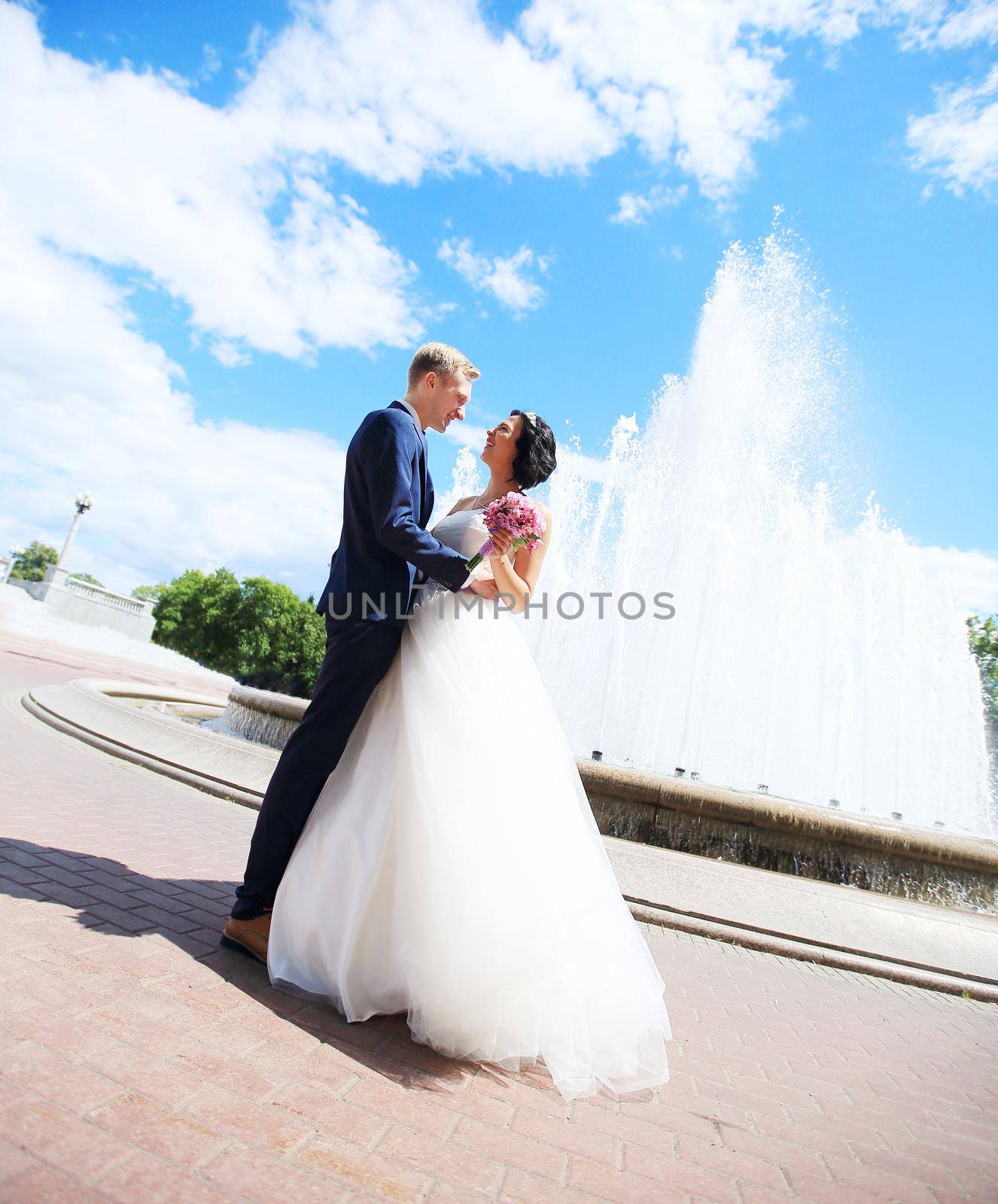 happy couple groom and bride on the background of the city.photo with copy space