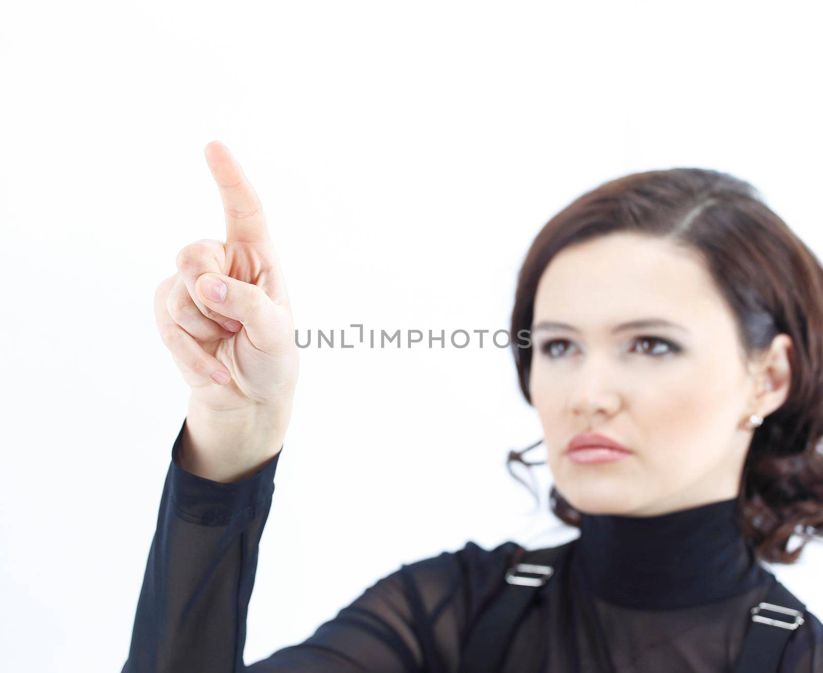 girl with index finger presses virtual button on white background