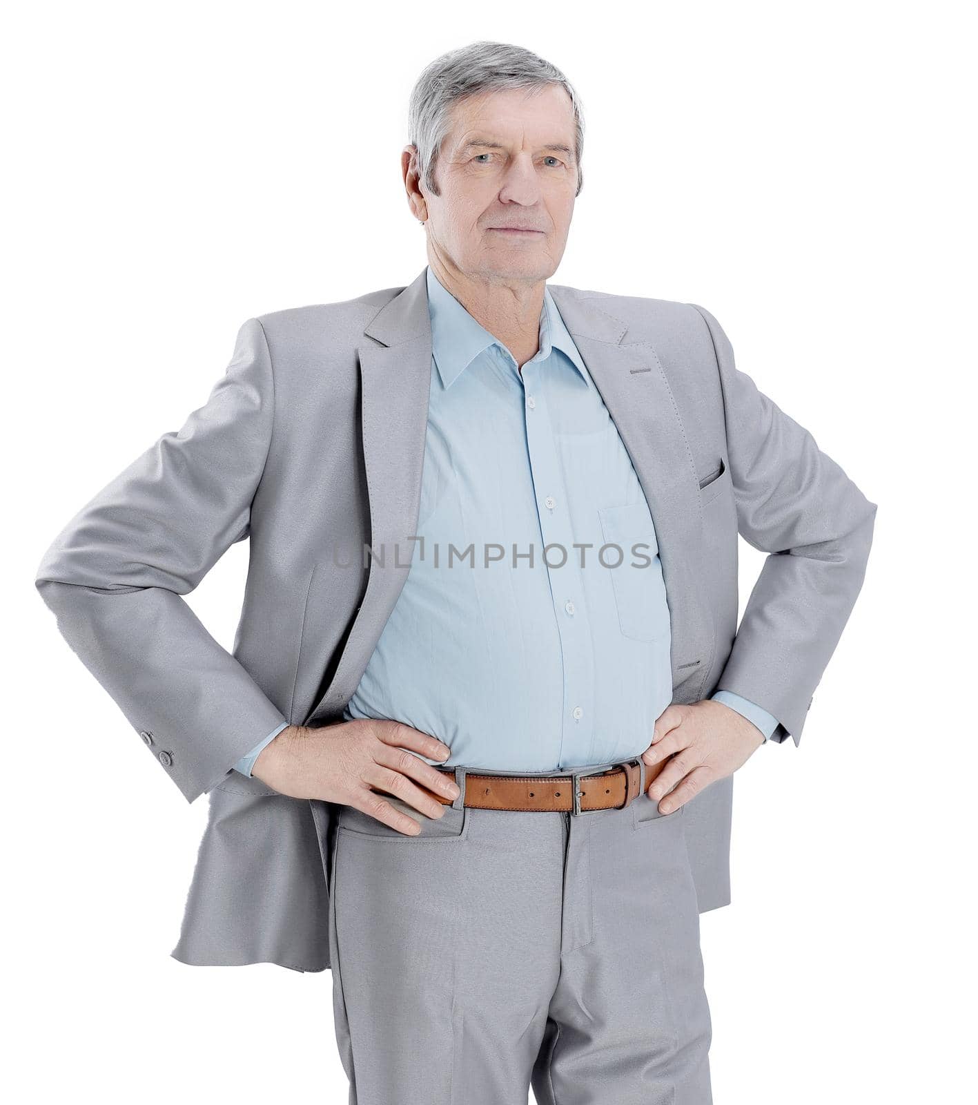 in full growth. confident senior businessman isolated on white background
