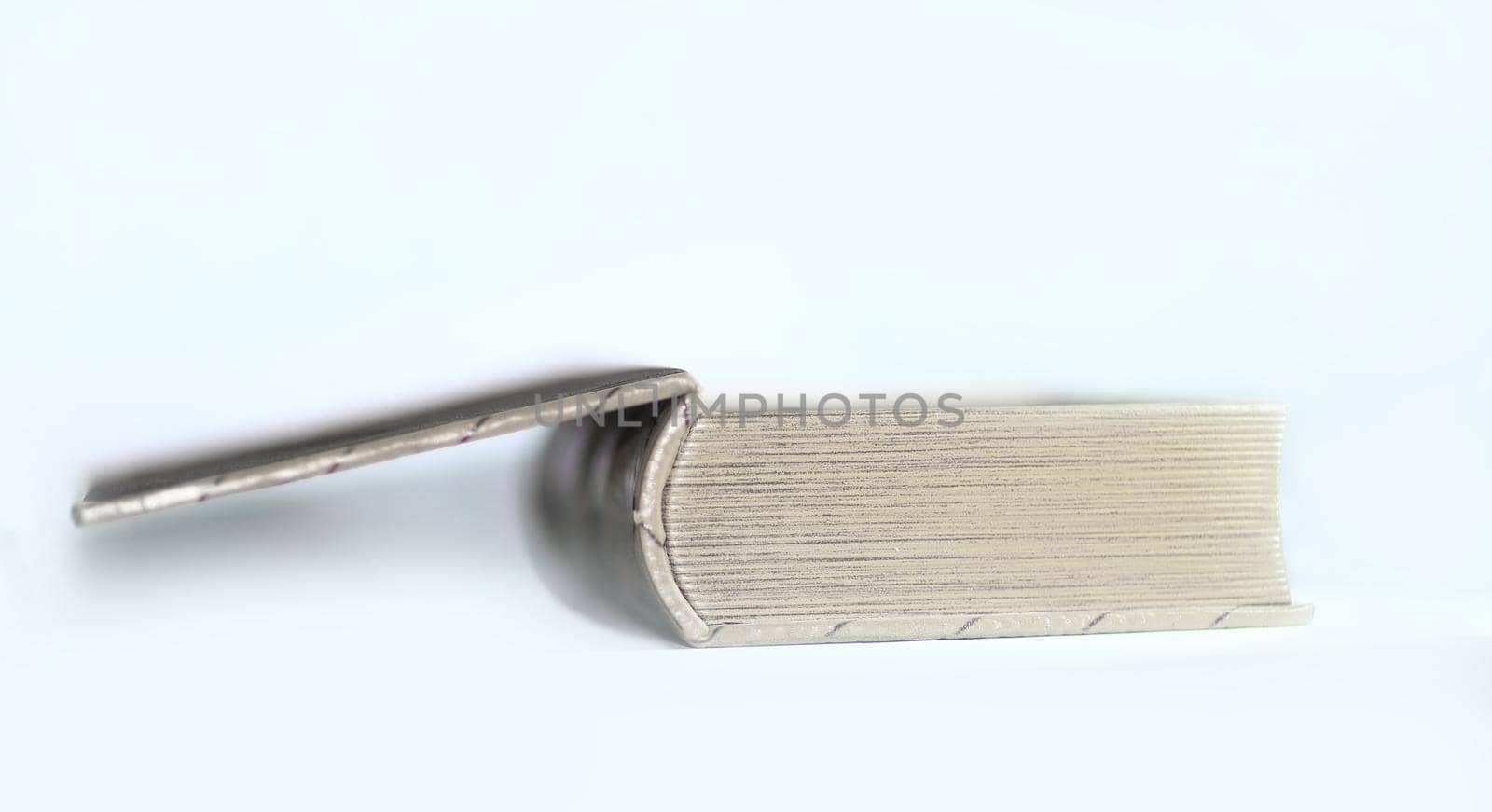 close up.thick old open book. photo with copy space by SmartPhotoLab