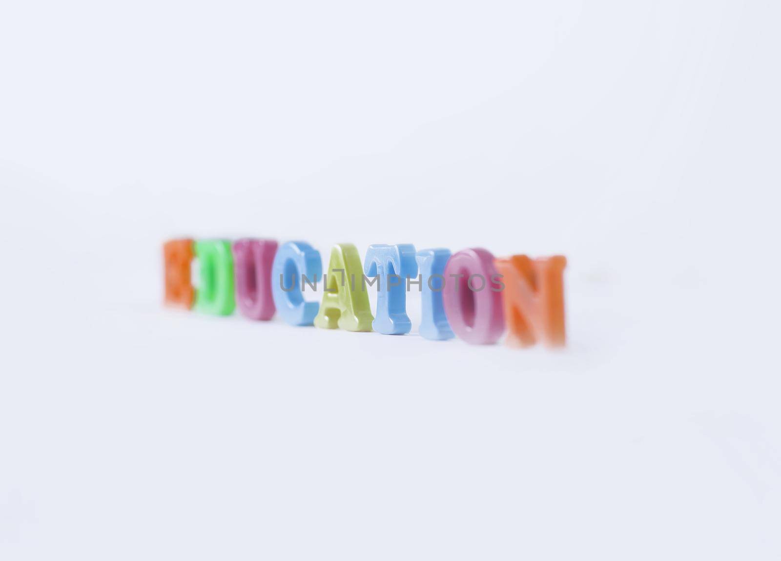 blurred image of the word formation on a light background .photo with copy space.