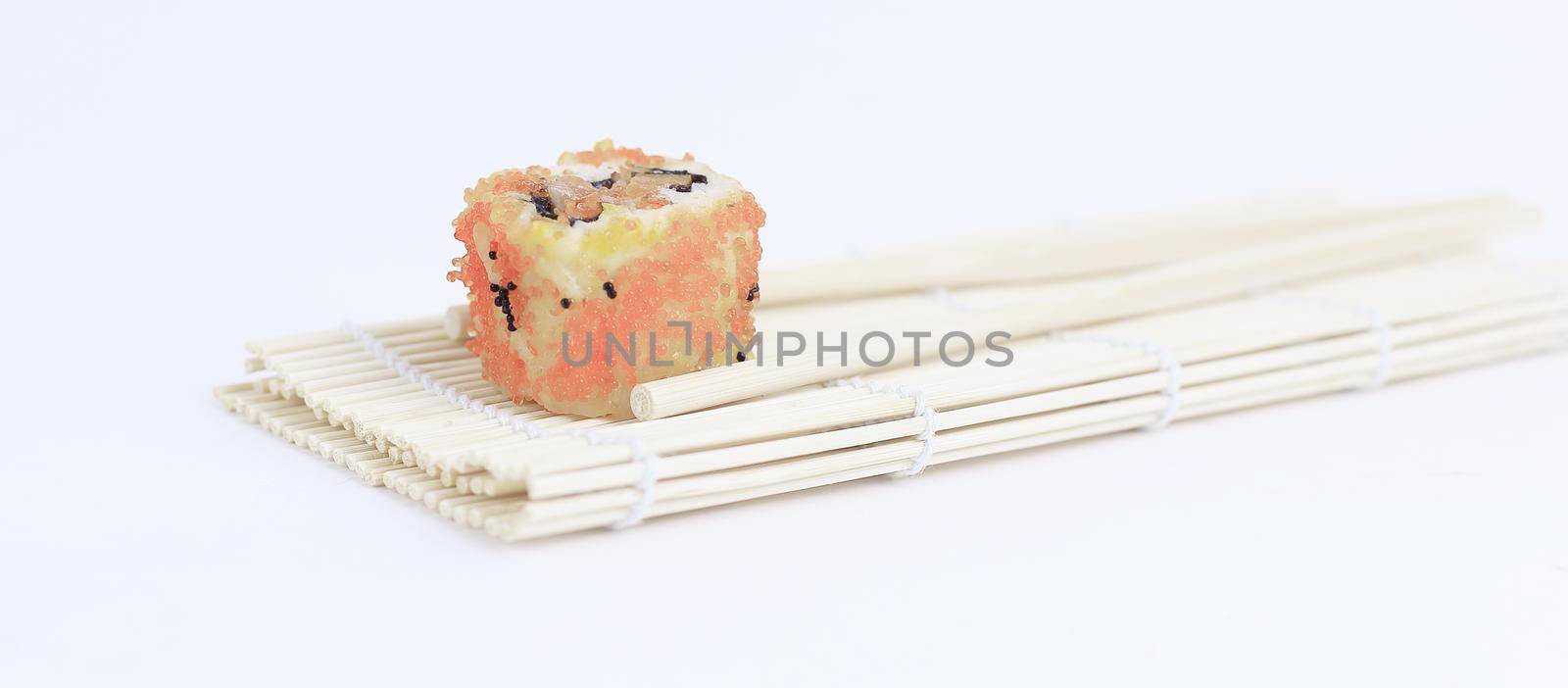 large sushi and chopsticks .isolated on a light background.photo with copy space