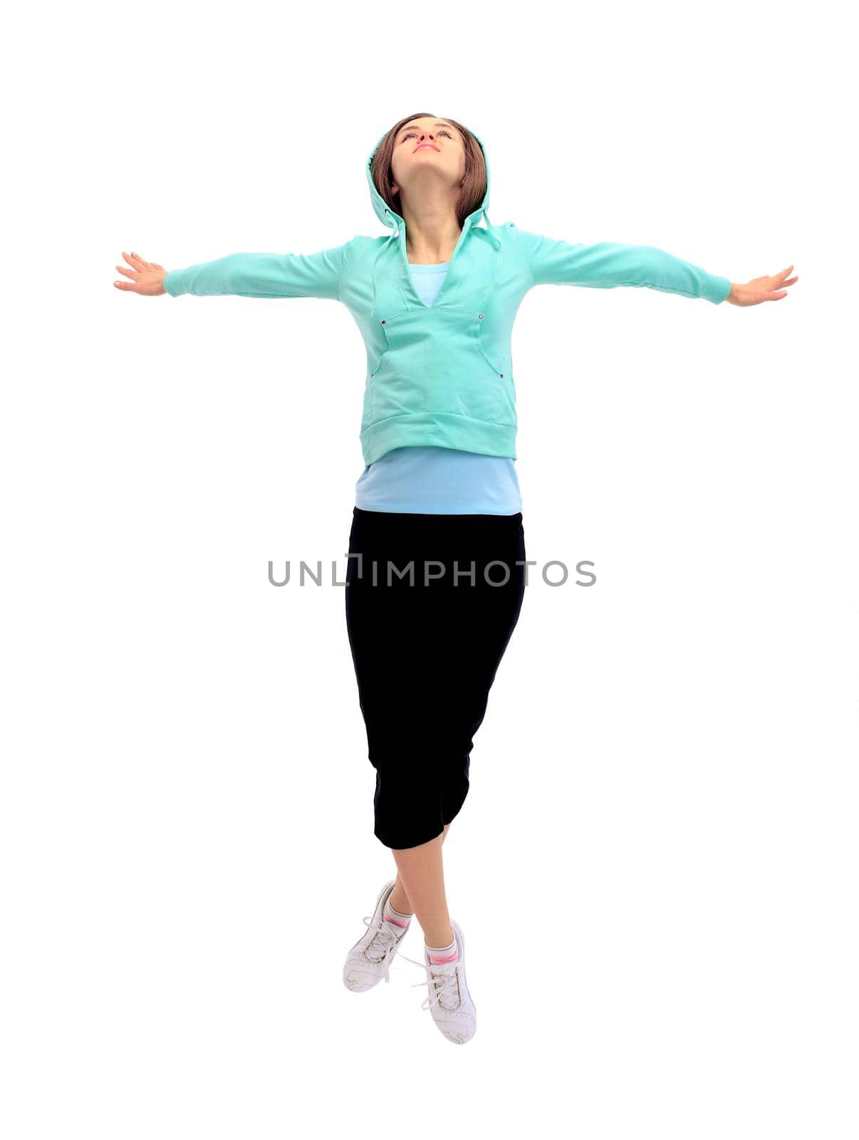 The beautiful young woman plays sports on a white background by SmartPhotoLab