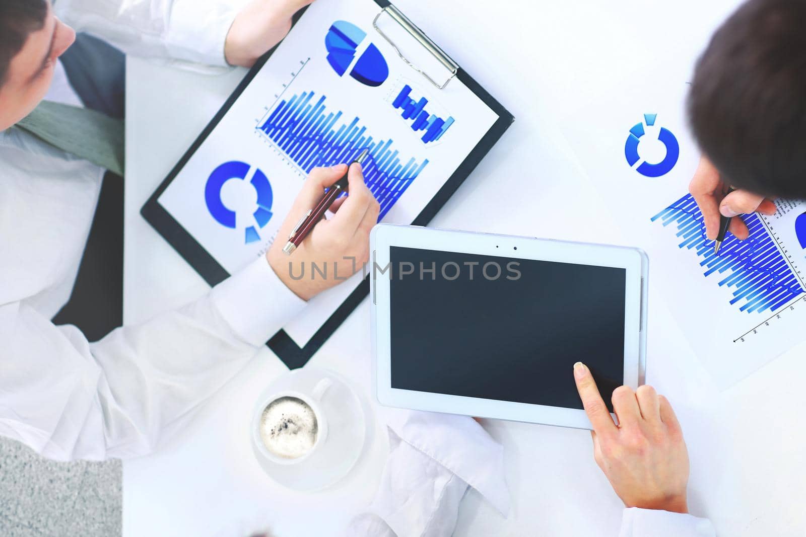 business, technology and office concept - smiling female boss talking to business team