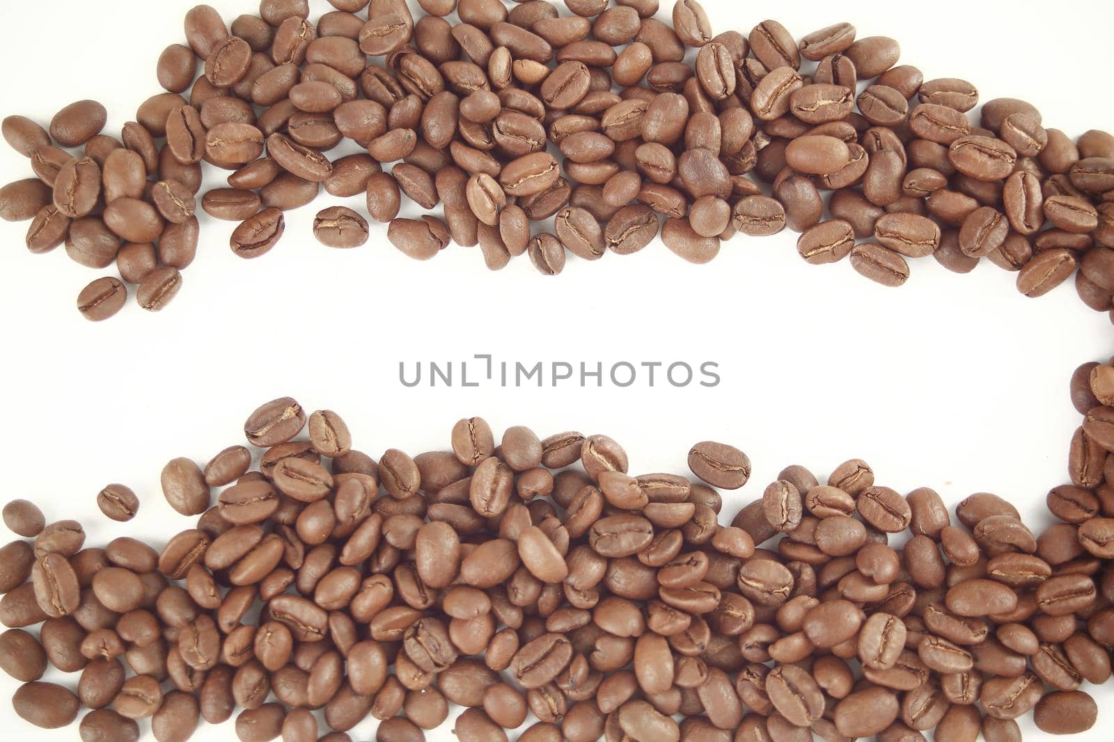 Coffee beans isolated on white background with place for text.