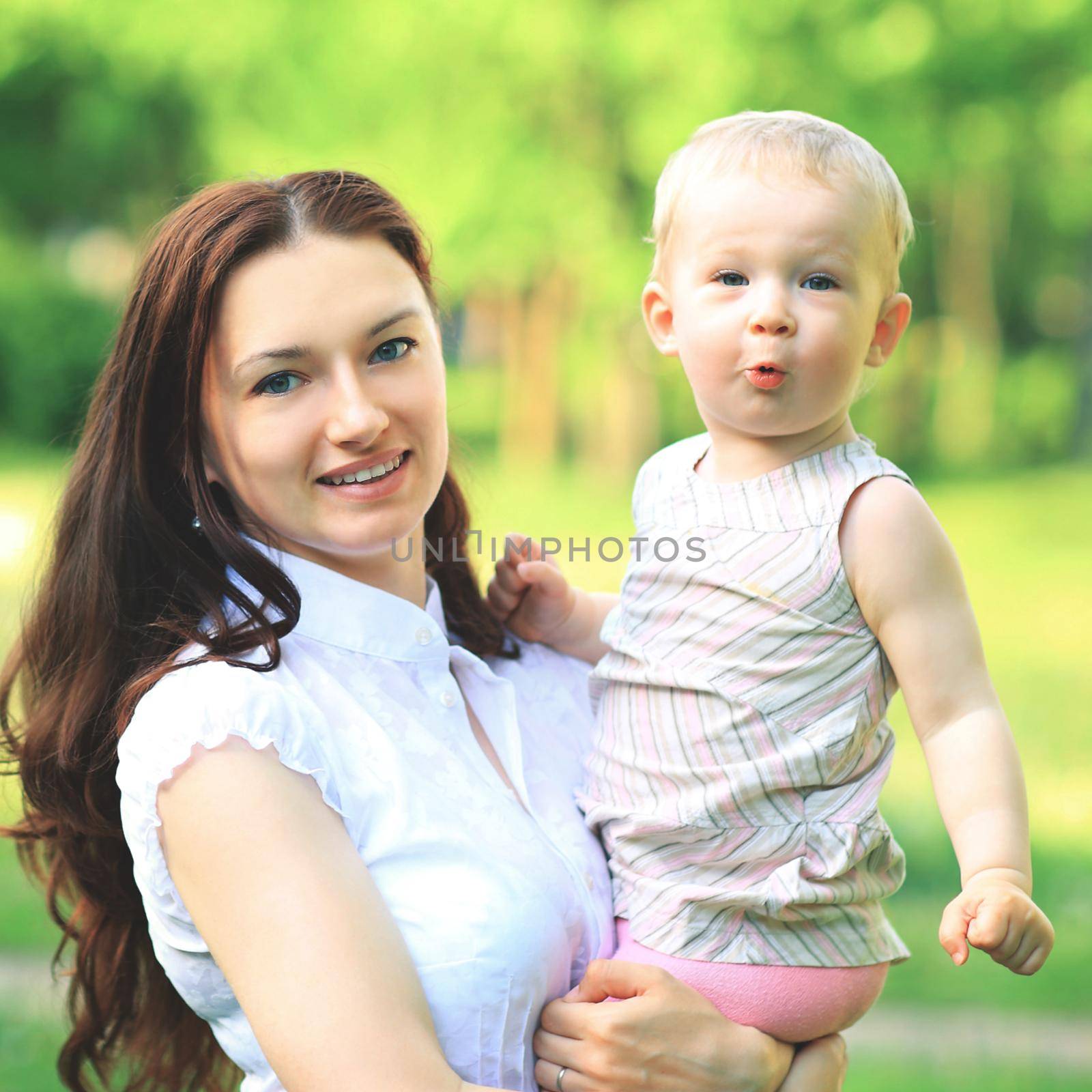 Happy mother and daughter laughing together