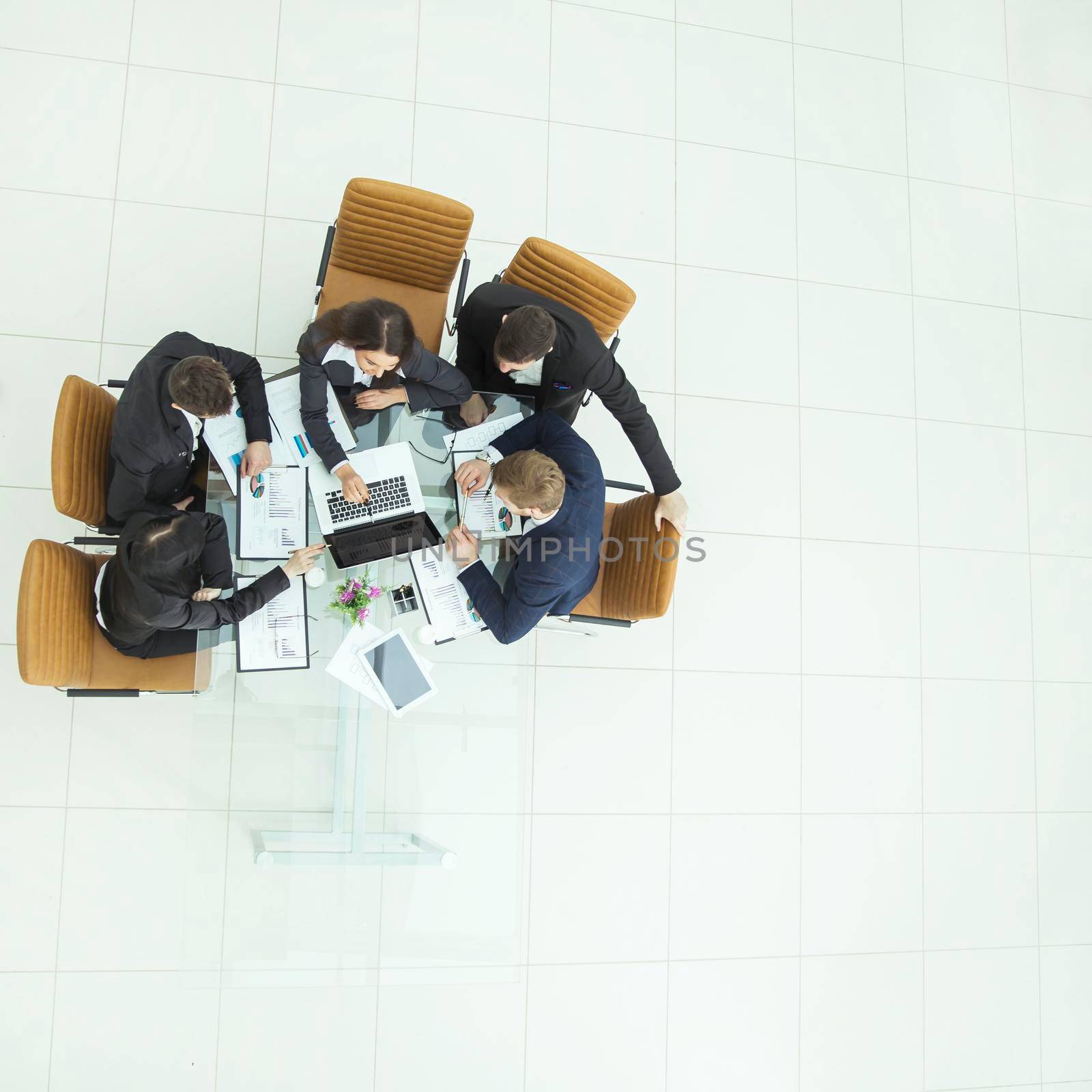 top view of successful business team working on a financial report on the company's profits.the photo has a empty space for your text
