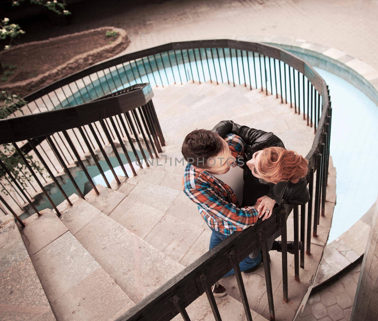 loving young couple hugging on the terrace of a country house by SmartPhotoLab