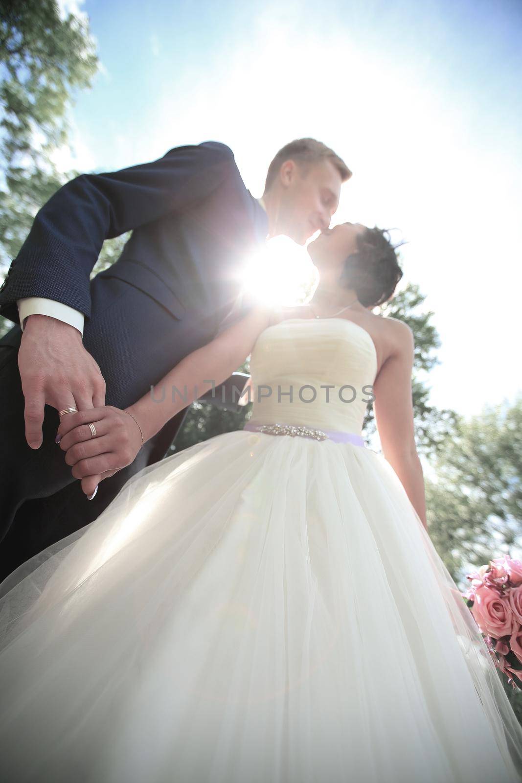 closeup. portrait of affectionate bride and groom. outdoor