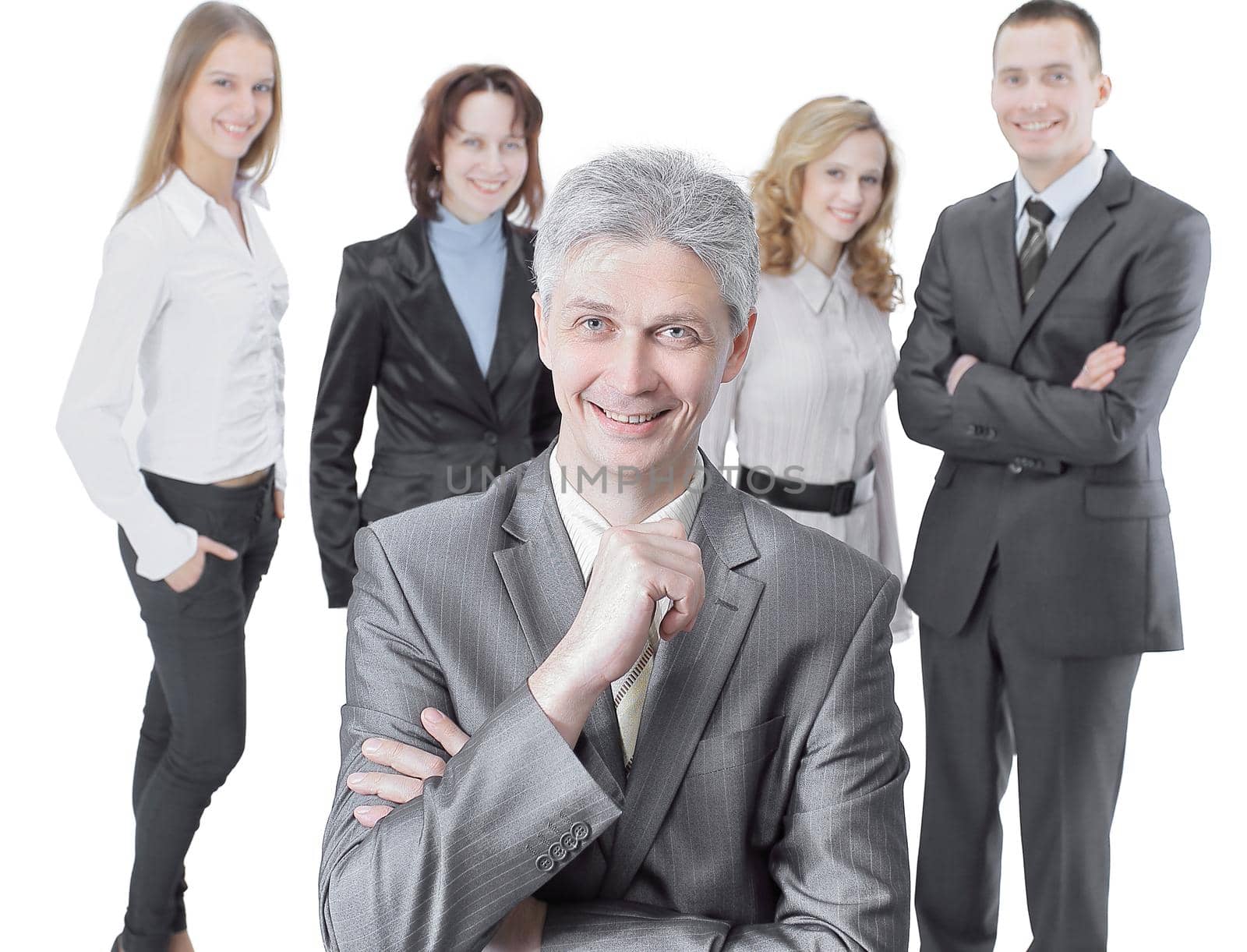 successful businessman on the background of business team.isolated on a white background