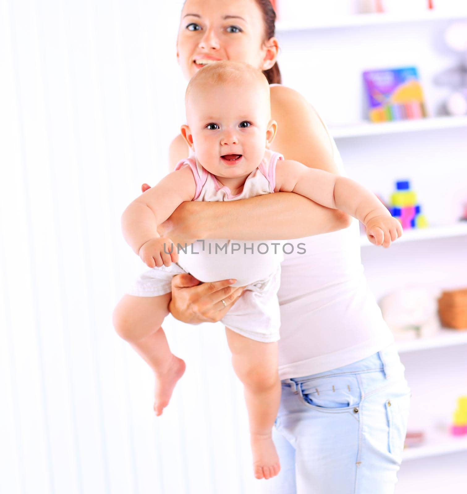 Portrait of angelic baby and his mother