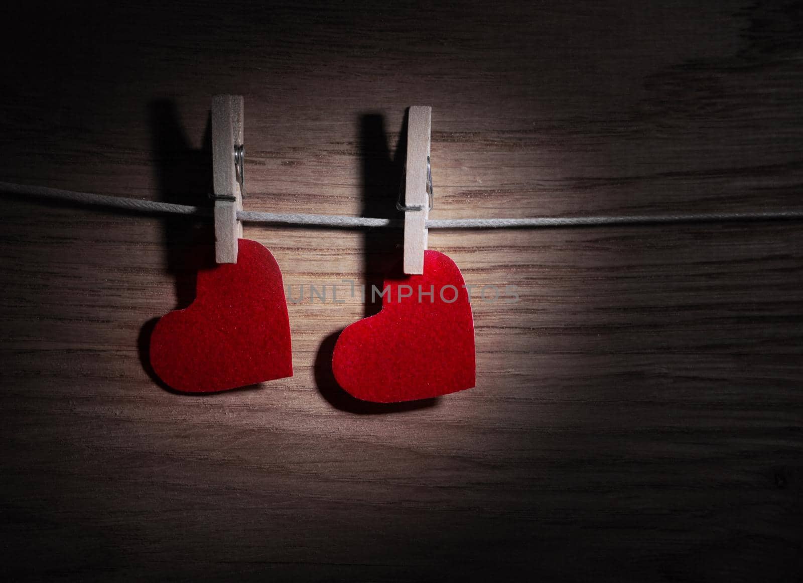 Red heart paper on wooden background.Image of Valentines day