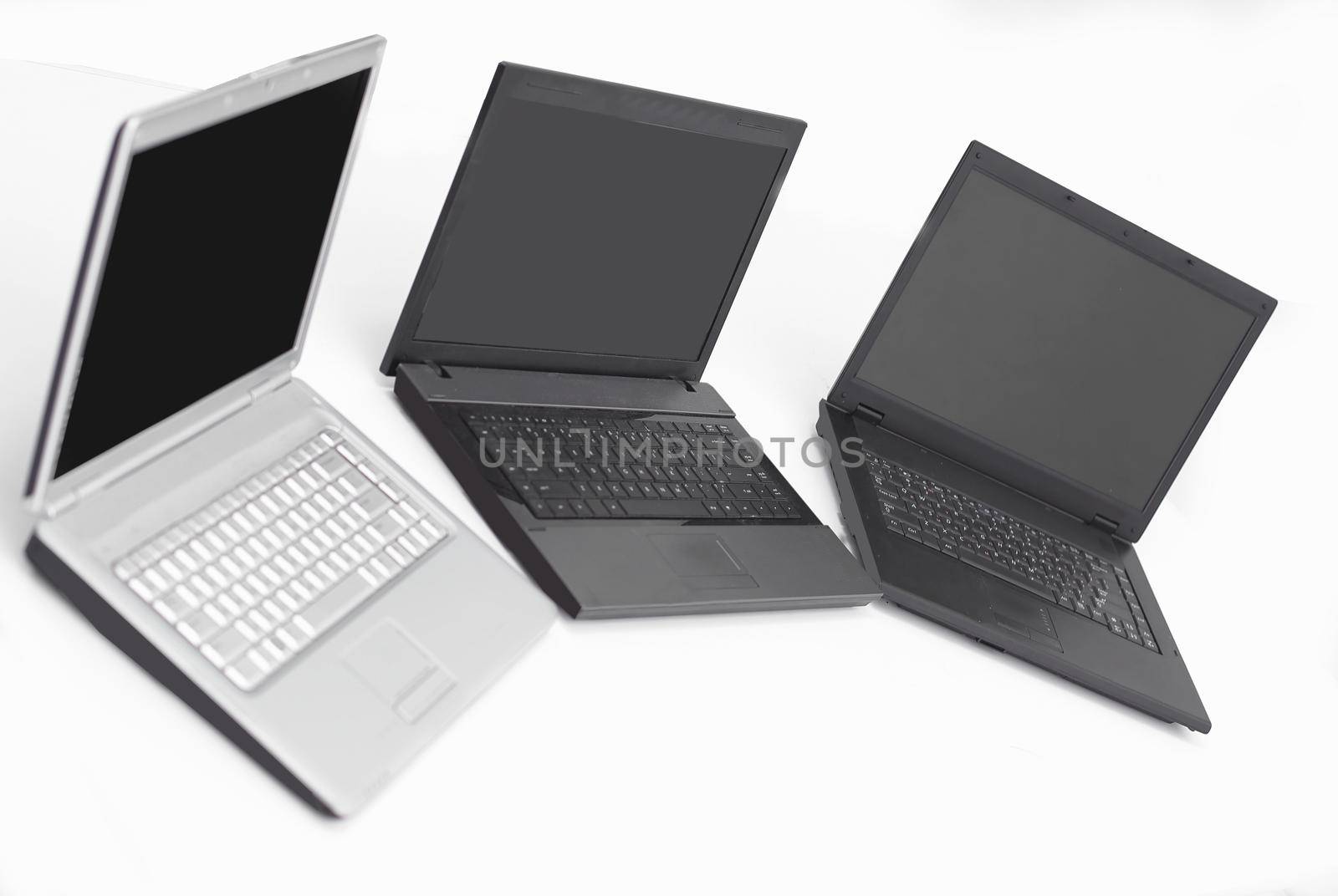 open laptop on the desktop in an empty office .isolated on white .photo with copy space