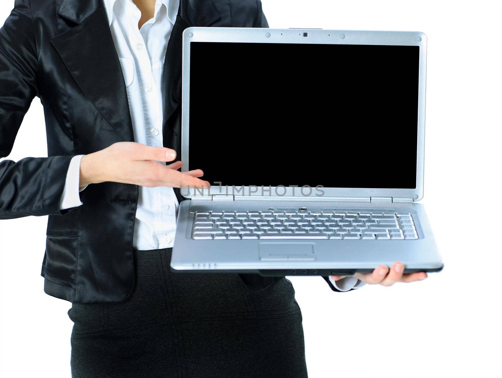 Businesswoman keeps the laptop. Isolated on a white background.
