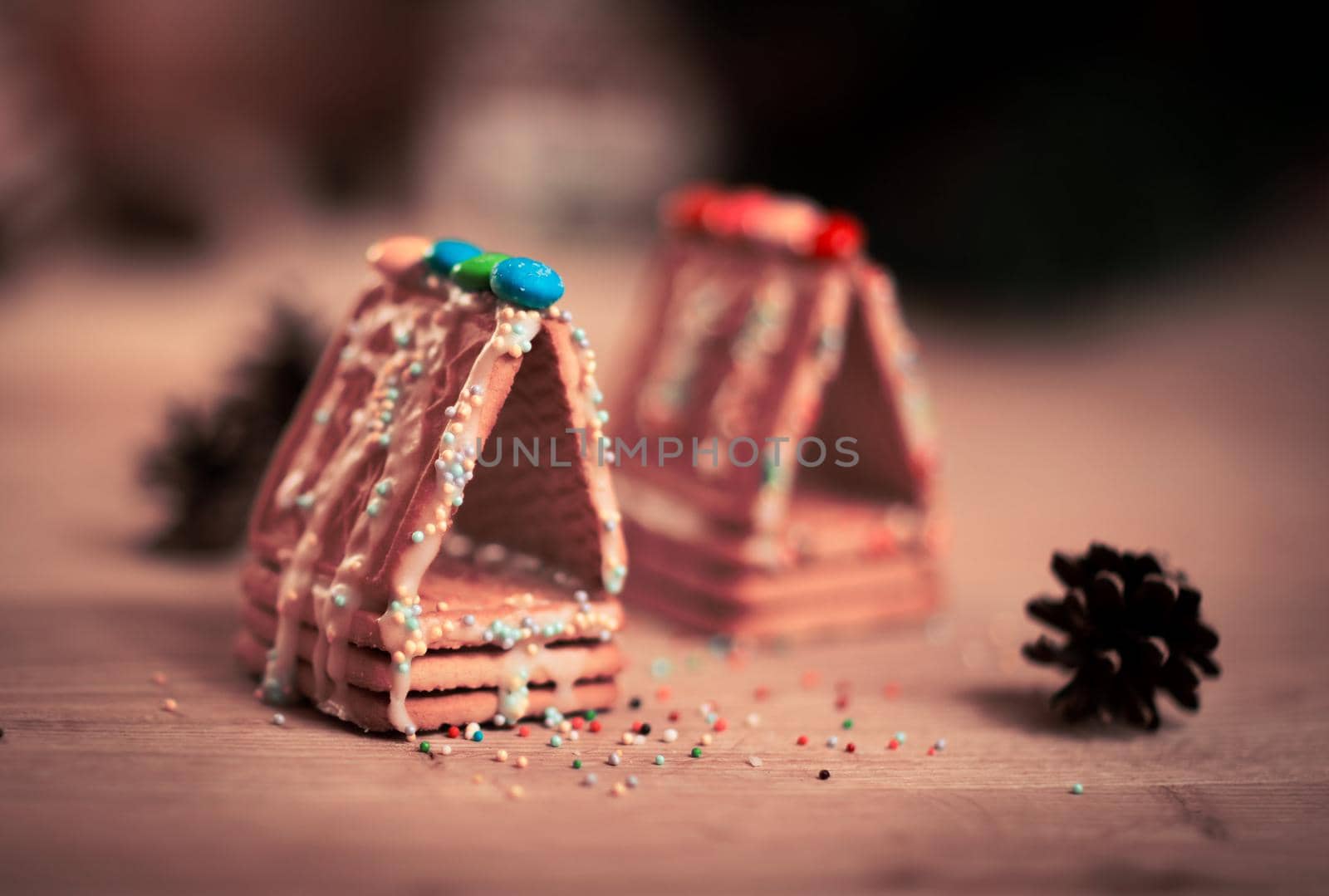 beautiful gingerbread house on wooden background with Christmas decorations