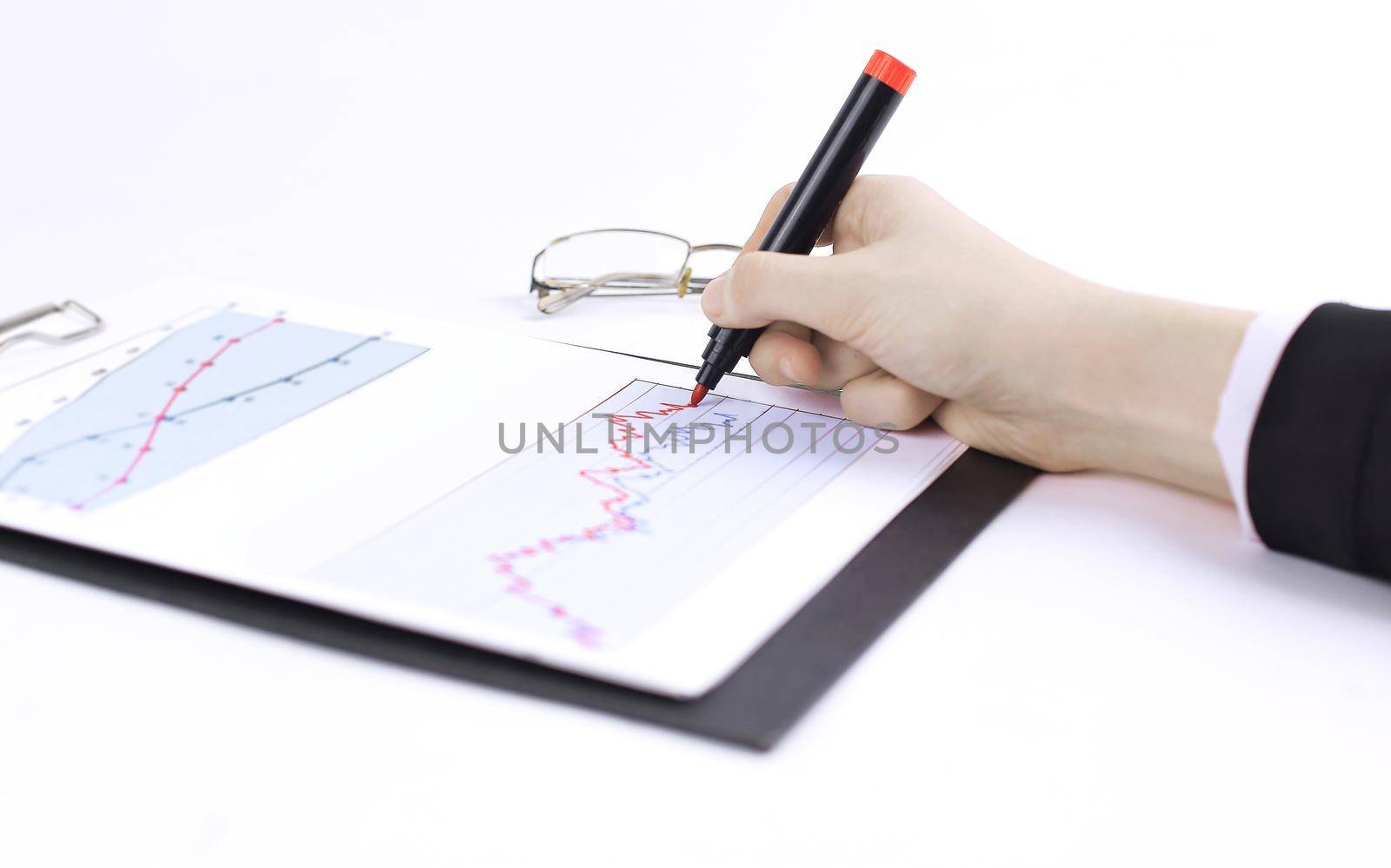 close-up. business woman working with a marketing schedule.isolated on white background