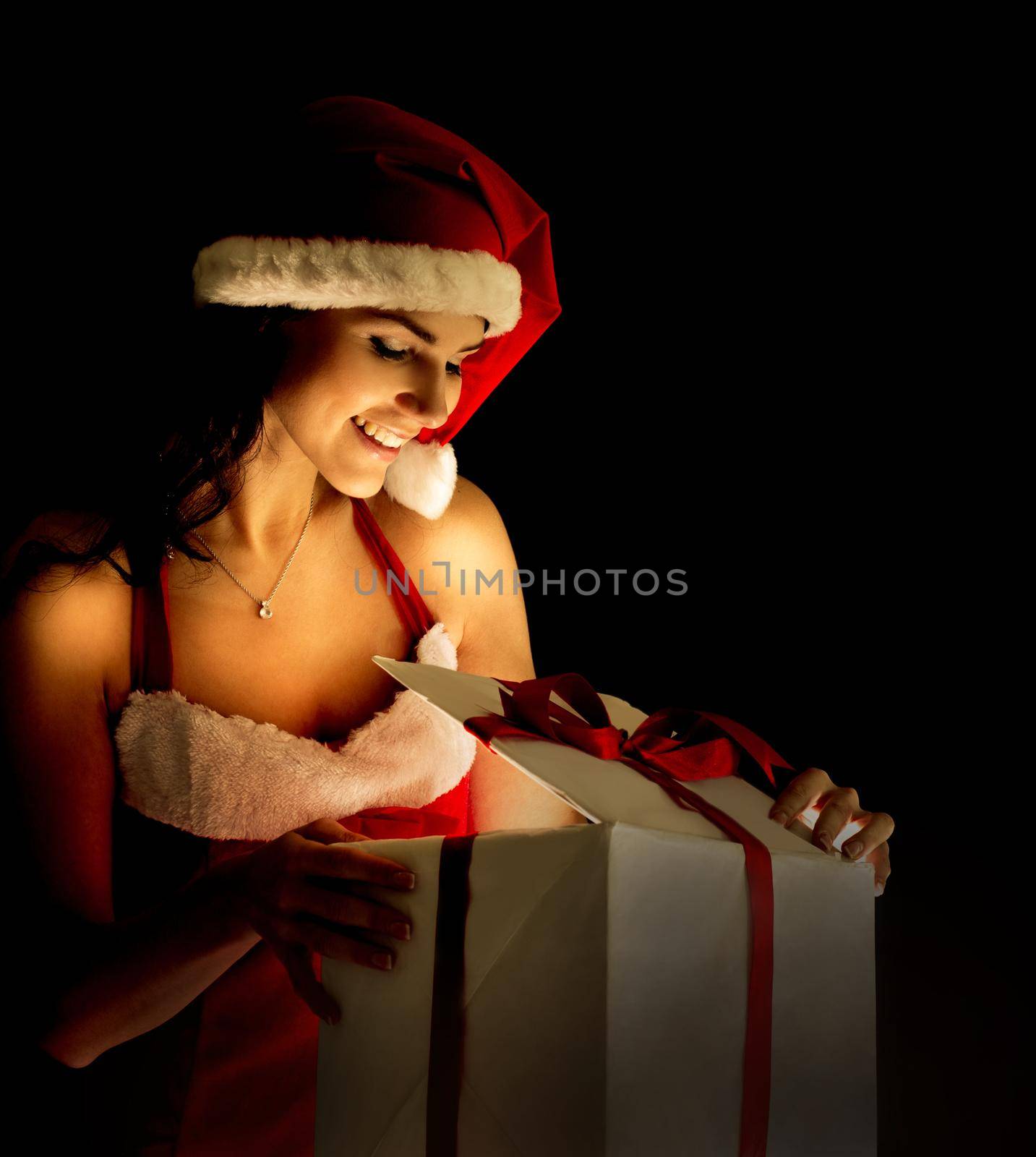 santa woman opening the magical Christmas present box