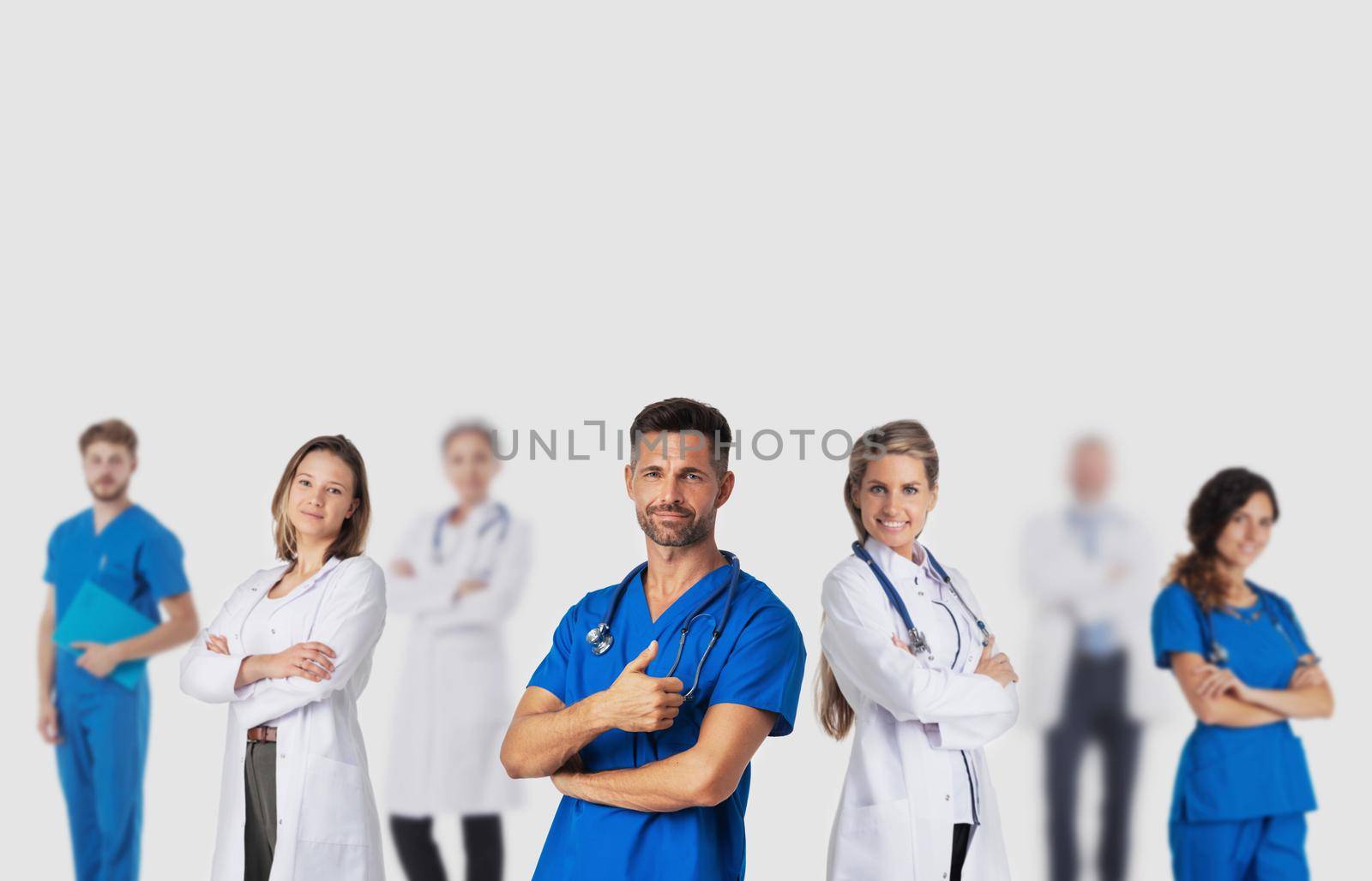 Group team of medical doctors. Health care. Isolated on gray background.