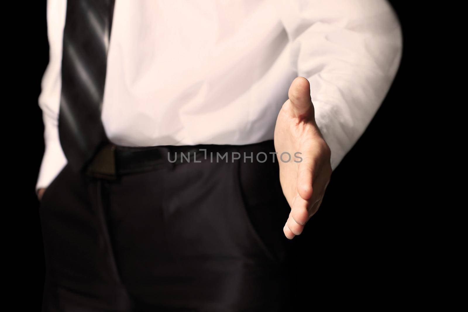 business man with an open hand ready to seal a deal by SmartPhotoLab
