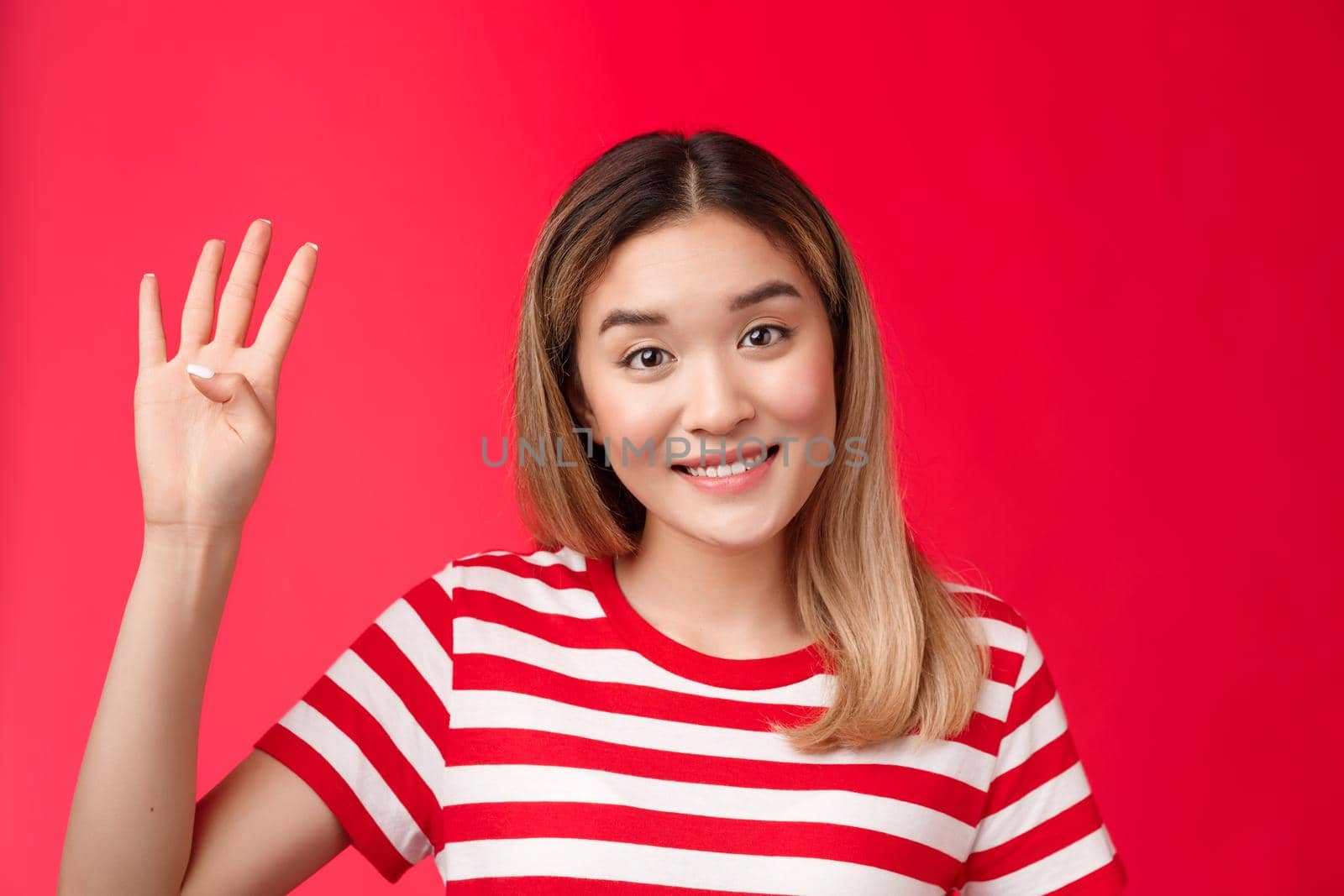 Cheerful good-looking cute asian blond girl show number four fingers smiling lovely wanna participate fourth, grinning delighted make recervation, order food, stand red background.