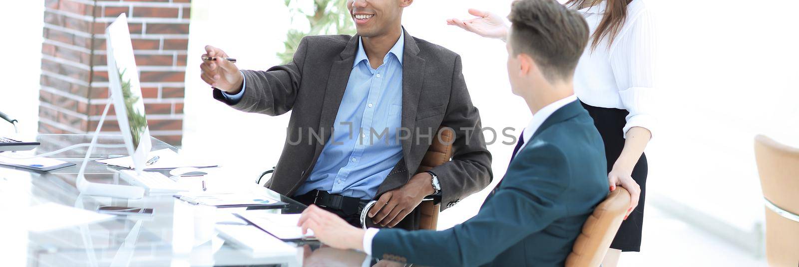 business team in the workplace in the office. by SmartPhotoLab