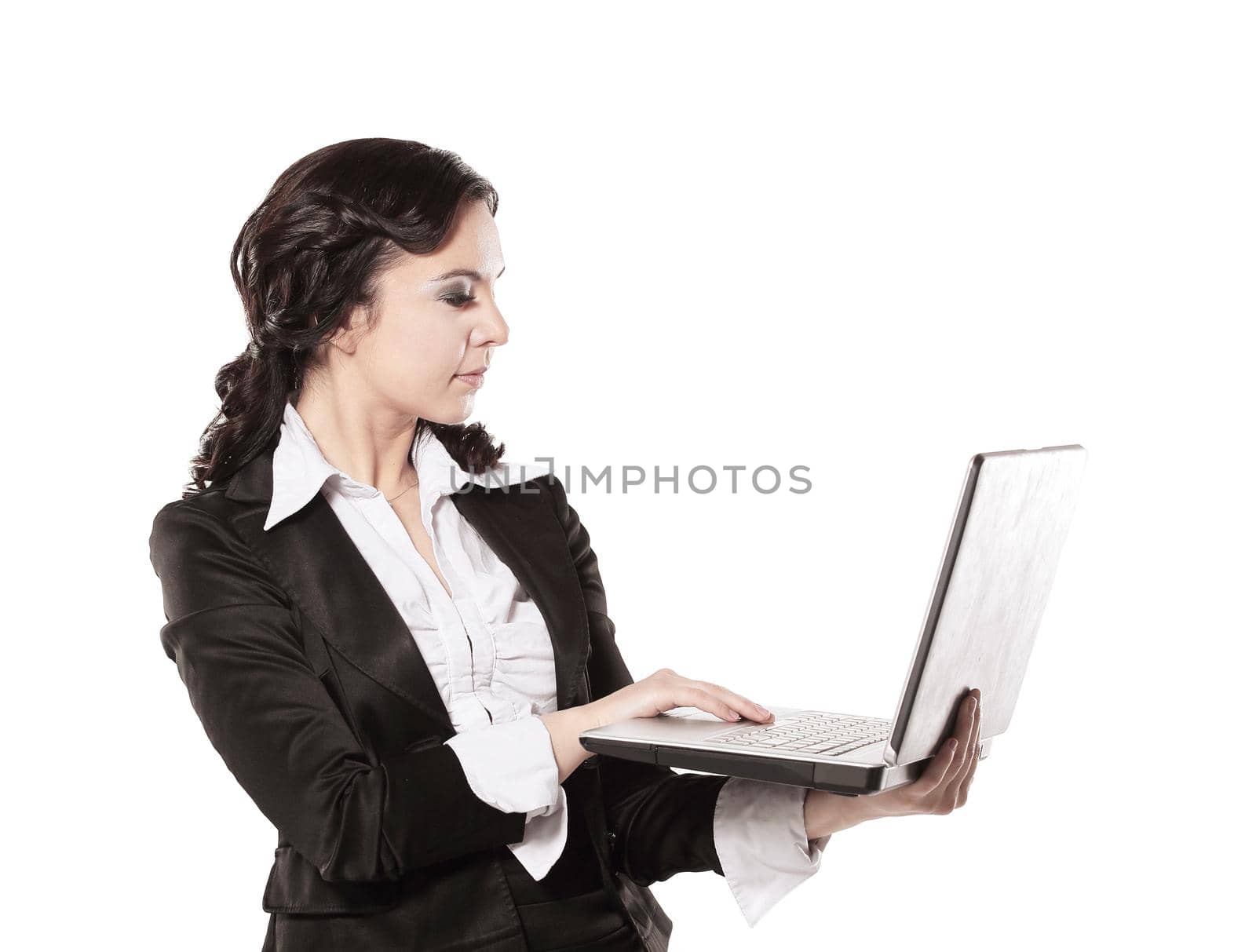 Portrait of a young happy business woman with a laptop over white background by SmartPhotoLab