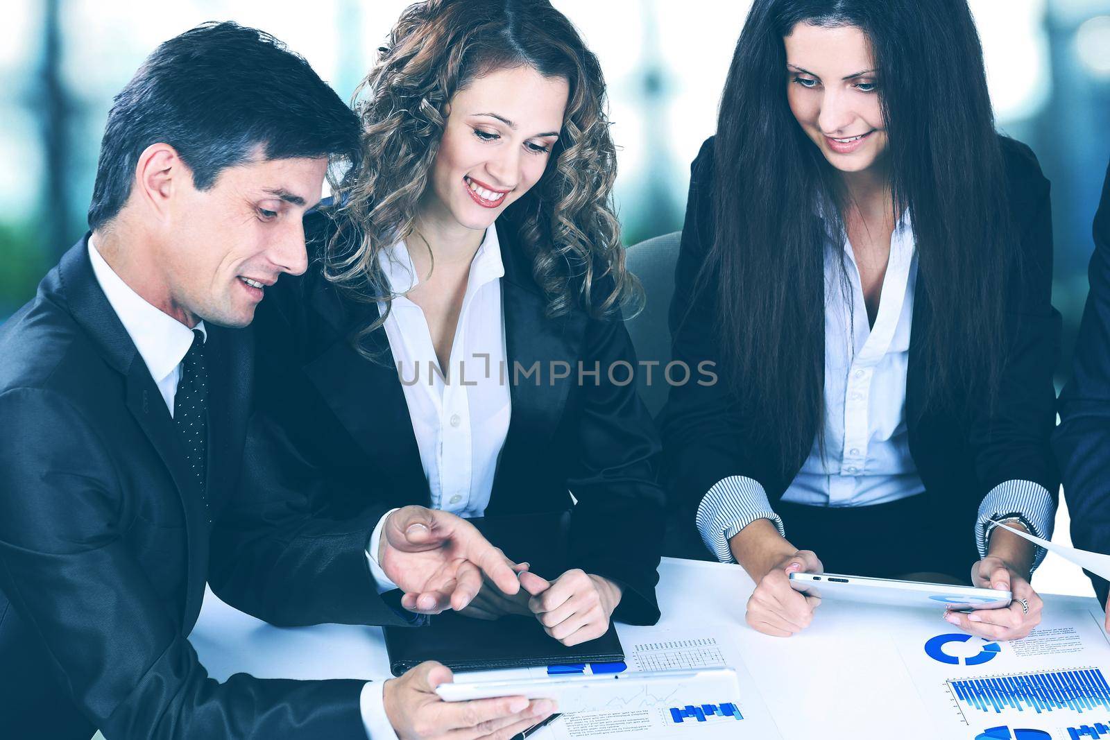 business, technology office concept - smiling female boss talking to business team by SmartPhotoLab