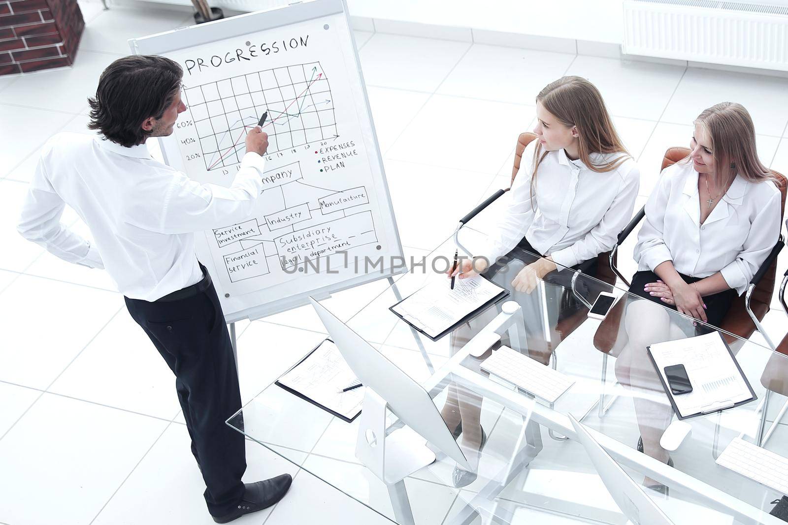 businessman presenting his new marketing plan to his coworkers.photo with copy space