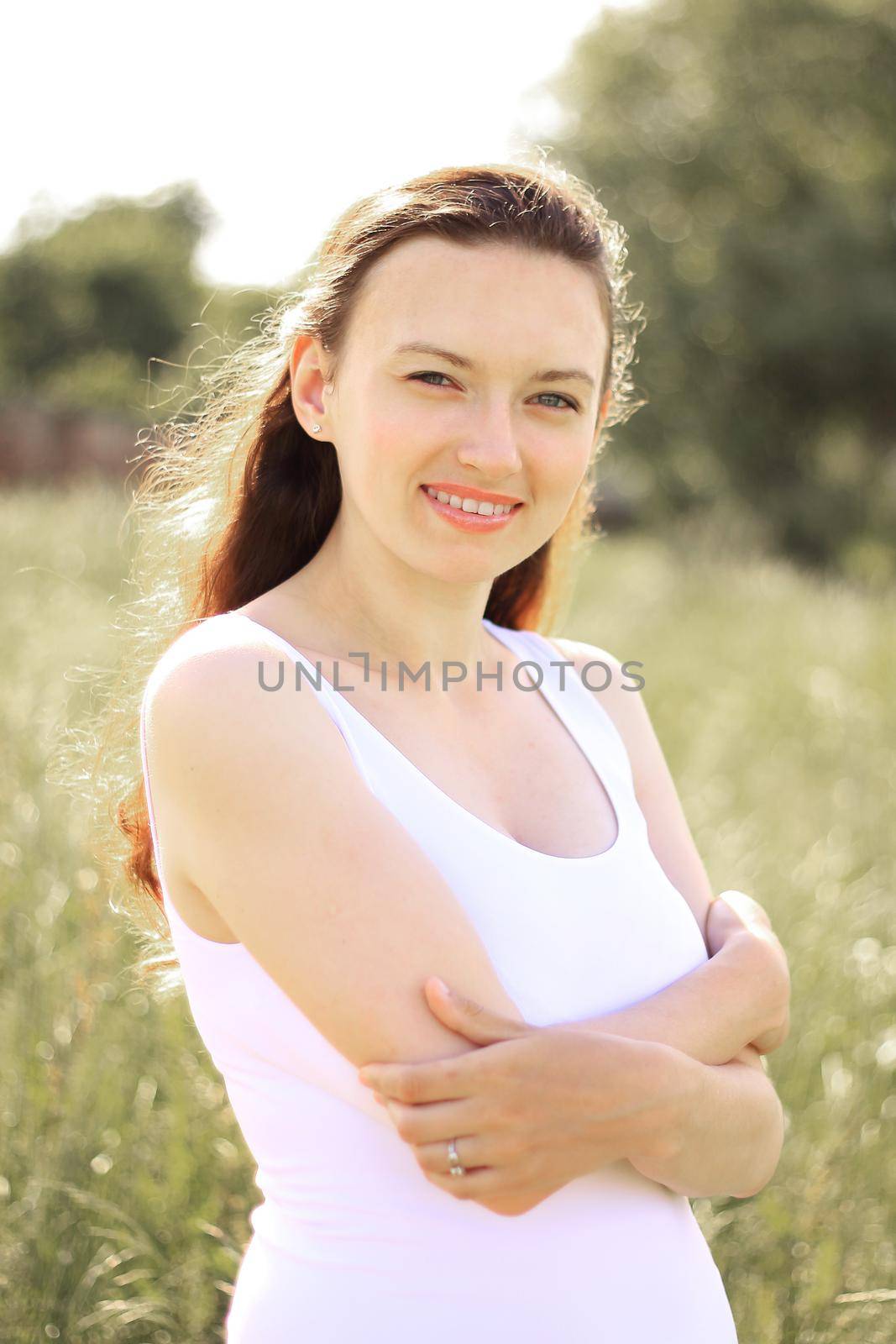 portrait of a modern young woman outdoors by SmartPhotoLab