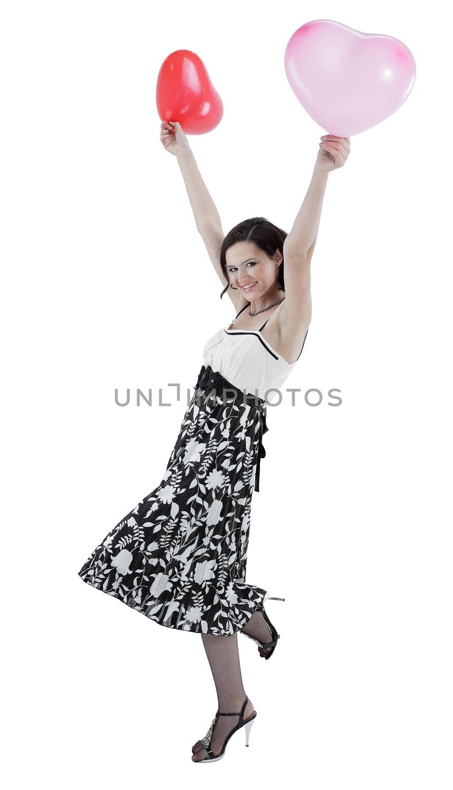 happy young woman holding red balloons. photo with copy space by SmartPhotoLab