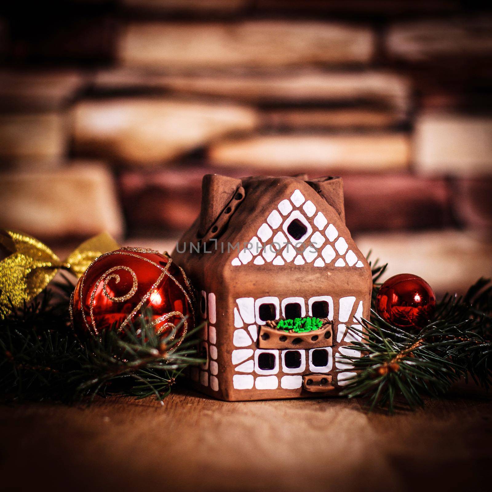 gingerbread house,Christmas balls. the concept of the celebration.photo with copy space