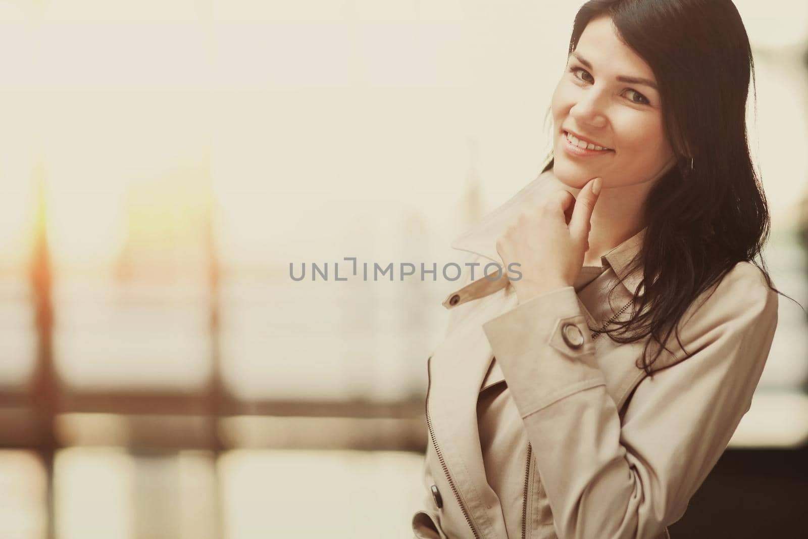Portrait of a smiling successful business woman, there is an empty space for text by SmartPhotoLab