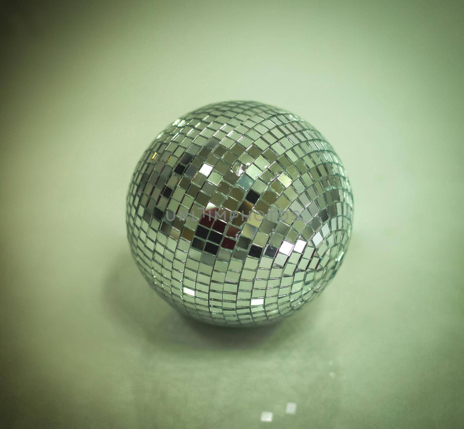 mirror ball.isolated on a dark background. by SmartPhotoLab