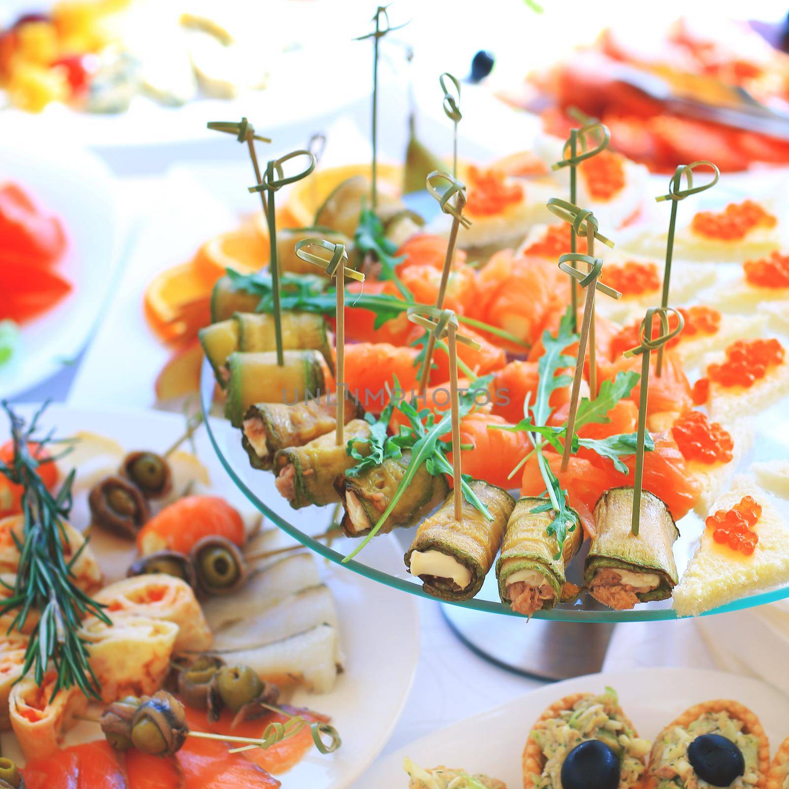 catering table set service with silverware and glass stemware at restaurant before party