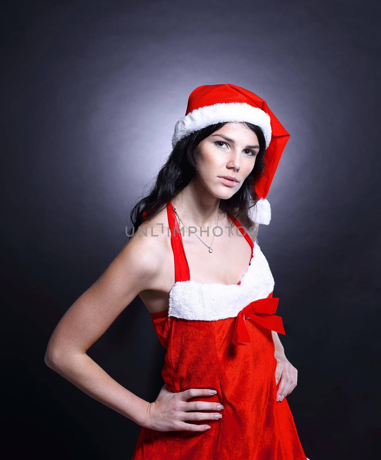 closeup. beautiful young woman in costume of Santa Claus.photo with copy space.