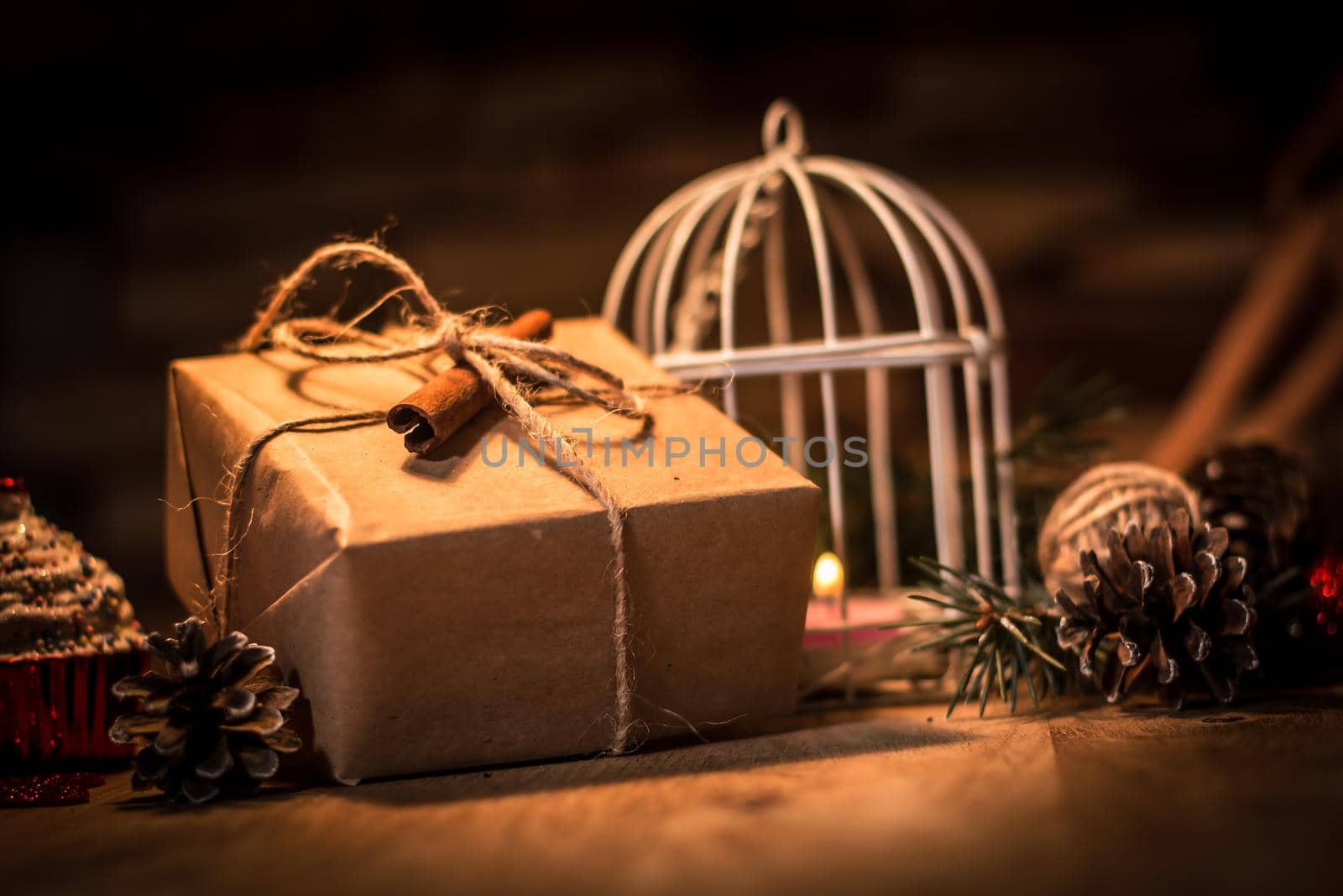 vintage gift box and candle on a Christmas background .photo with copy space