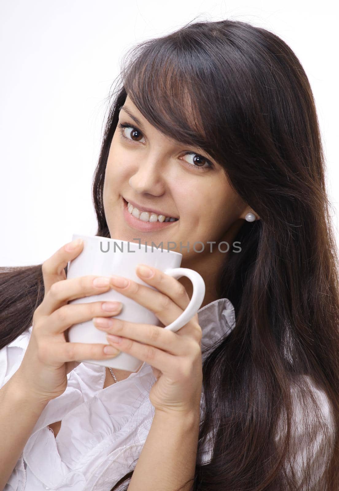 closeup.portrait of beautiful young woman holding a Cup of tea