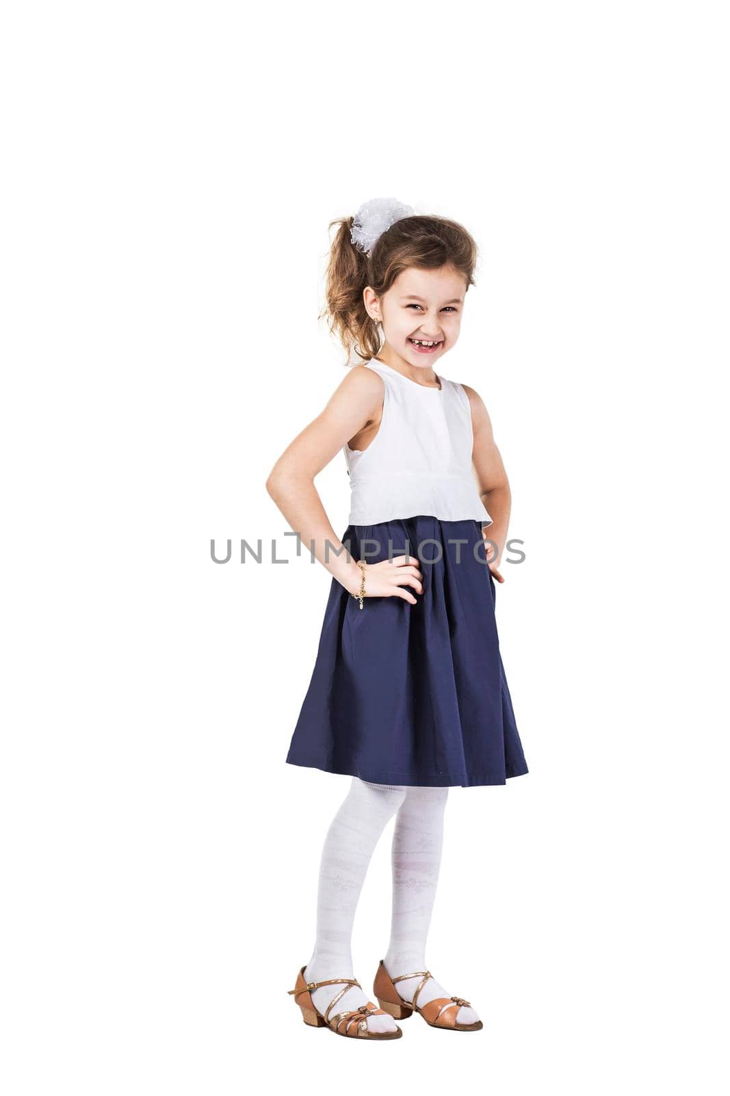 portrait of a happy six-year-old girl against white background by SmartPhotoLab