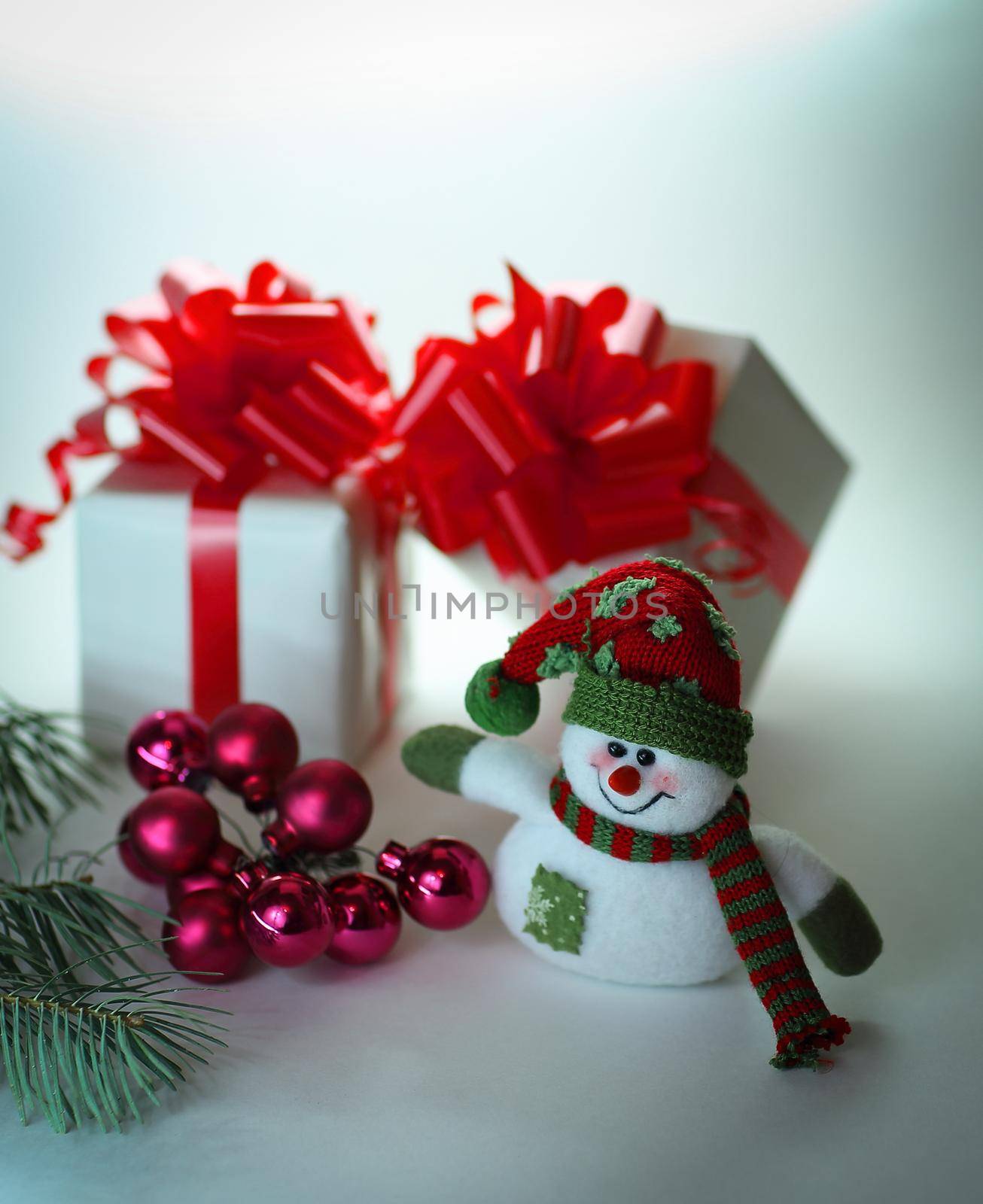 snowman , Christmas balls and gifts .isolated on white background .photo with copy space