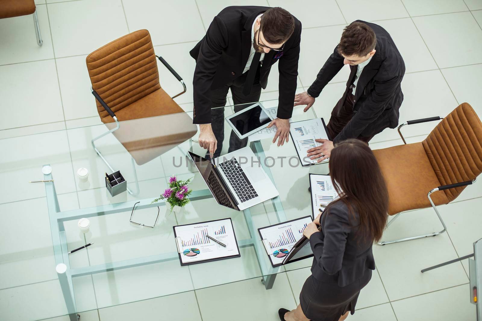 successful business team discussing a new financial plan of the company in the workplace in the office