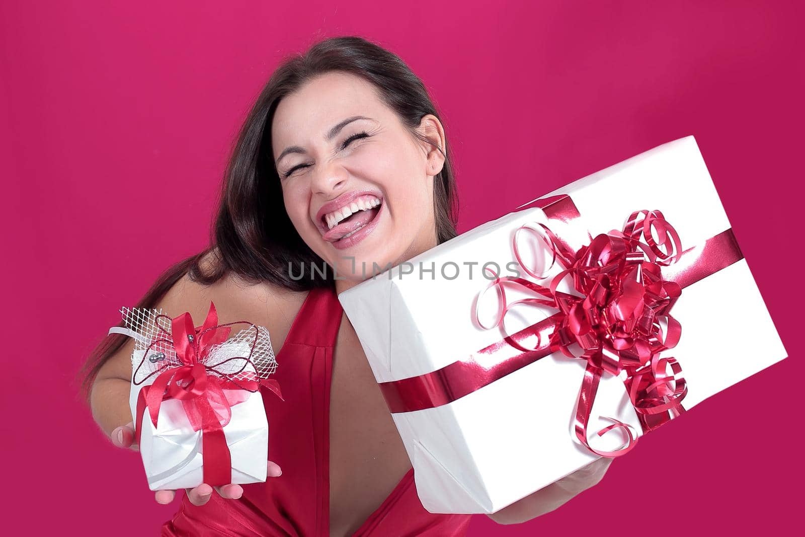 enthusiastic beautiful woman with her gifts looking at copy space.photo with copy space.