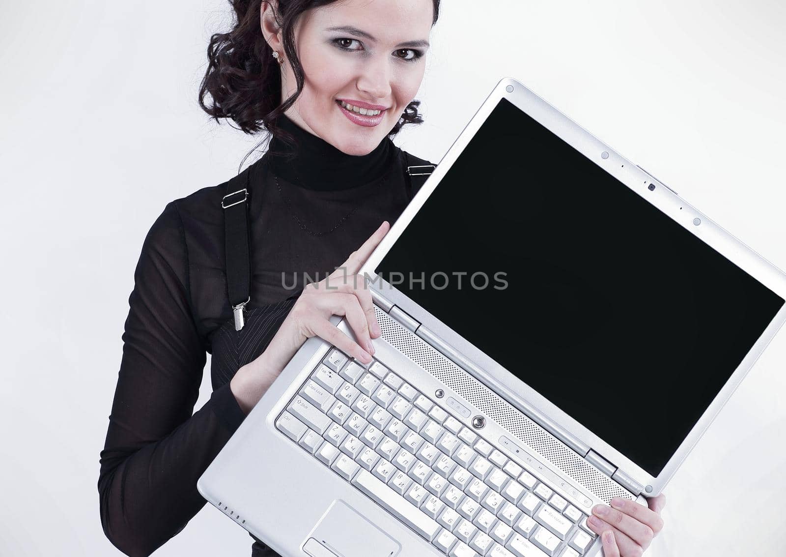 closeup.modern business woman showing a laptop. by SmartPhotoLab