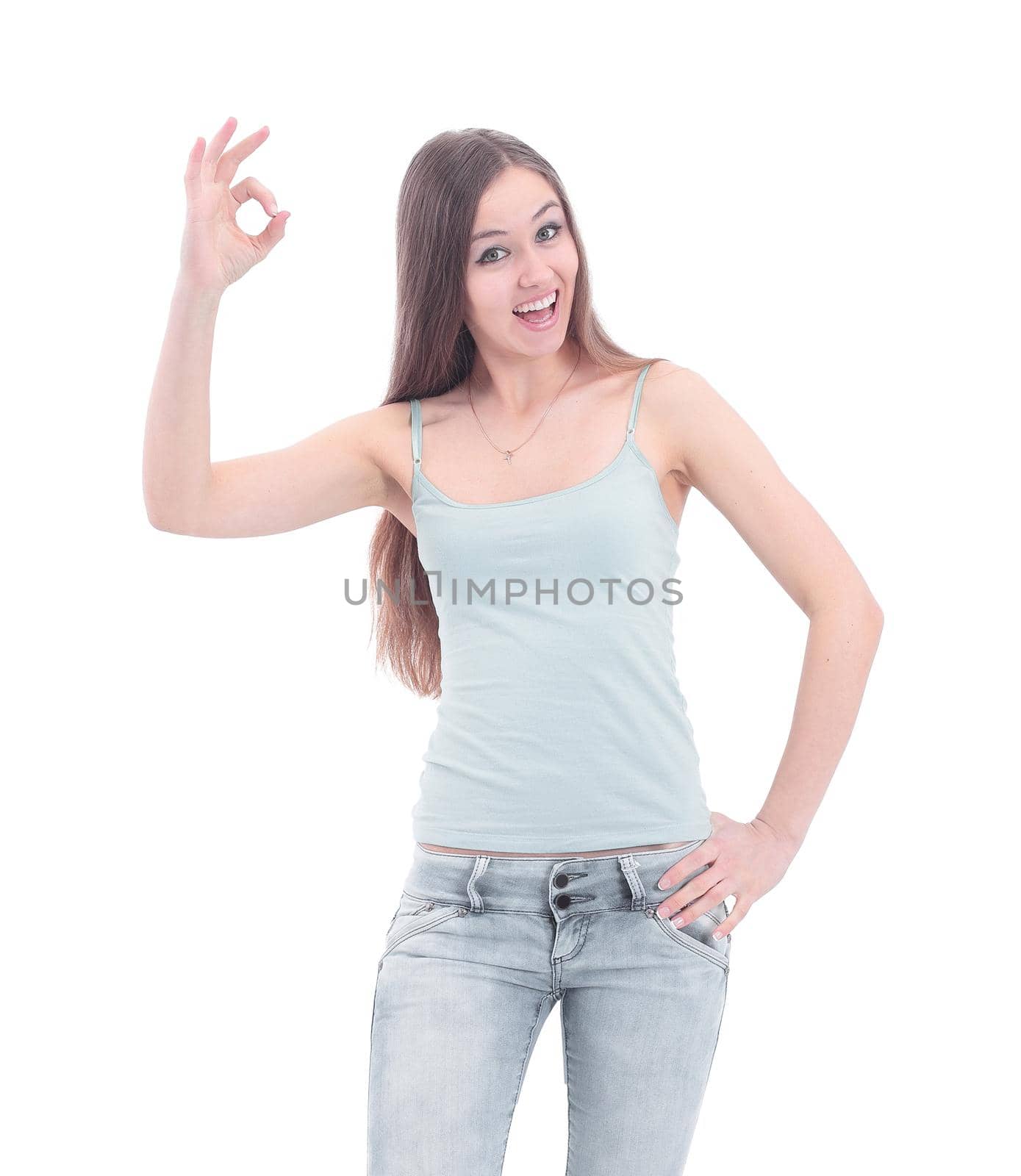 modern young woman showing the OK sign . isolated on a white background.photo with copy space