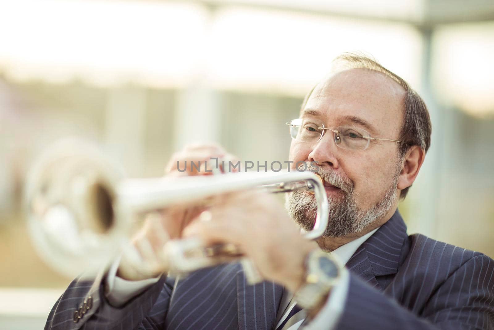 closeup of a professional musician performs a musical composition on the pipe
