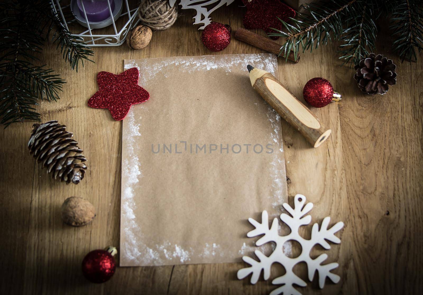 greeting card and pencil in the Christmas background.photo with copy space