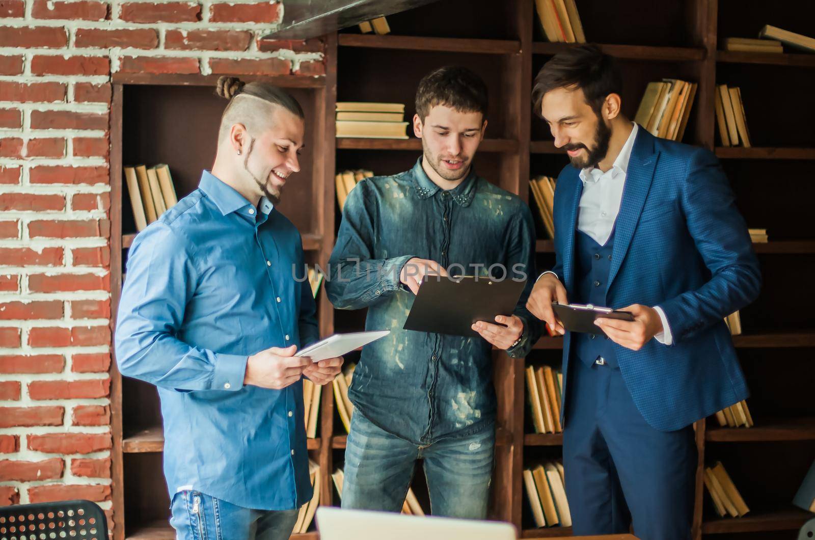 successful business team discussing the plan of work in a modern office