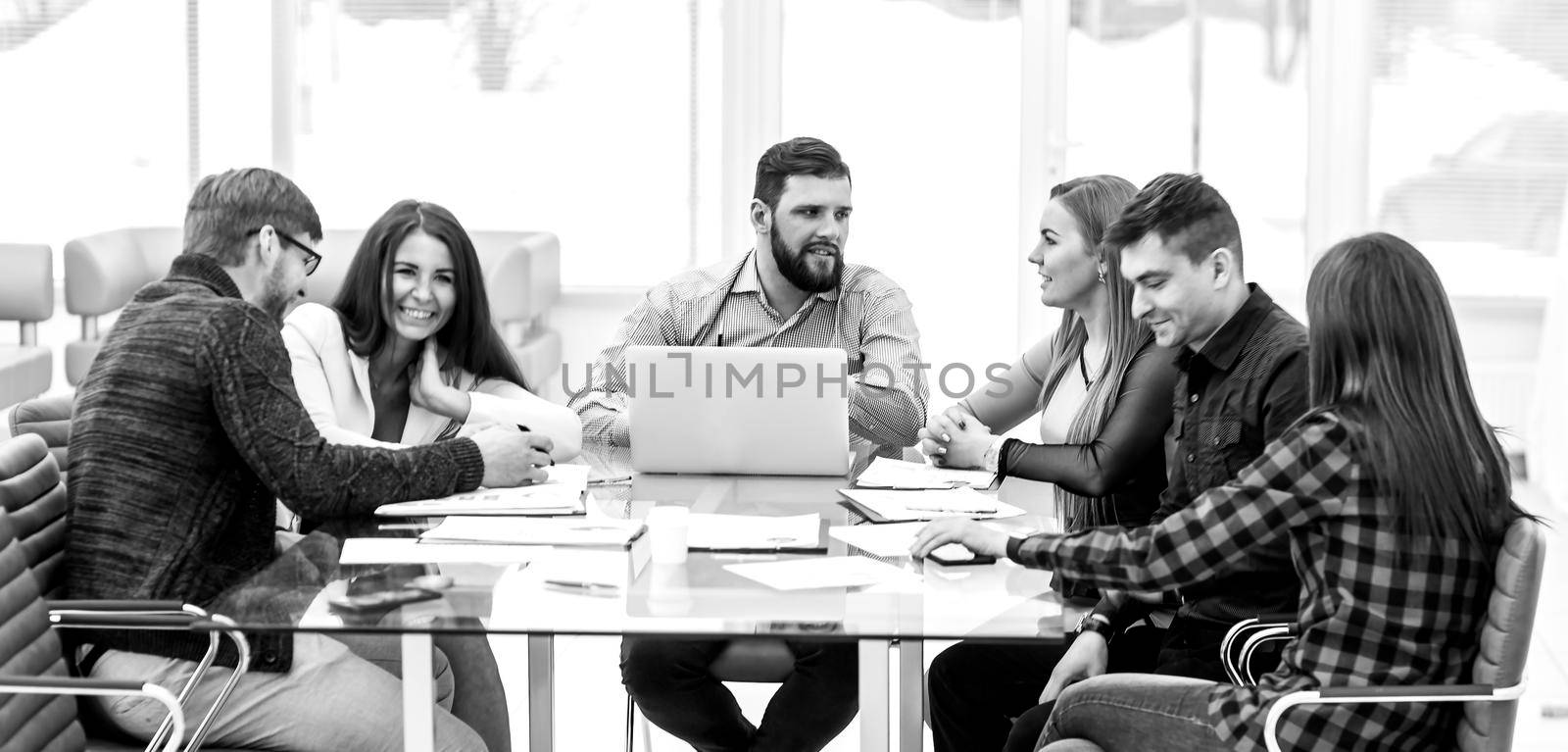 business team holding a working session at the working place in office by SmartPhotoLab