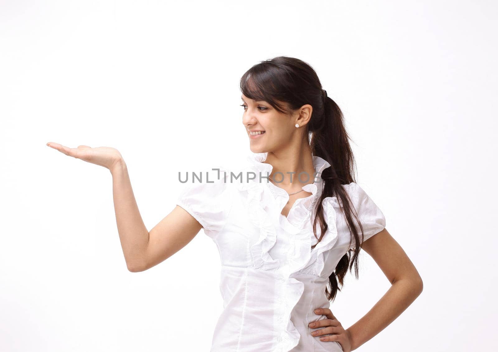 closeup.young business woman pointing at copy space by SmartPhotoLab