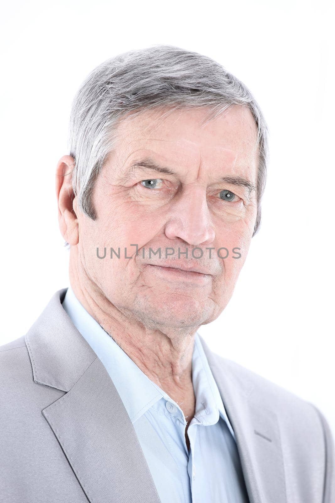 closeup.portrait of a senior businessman.isolated on a white background .photo with copy space